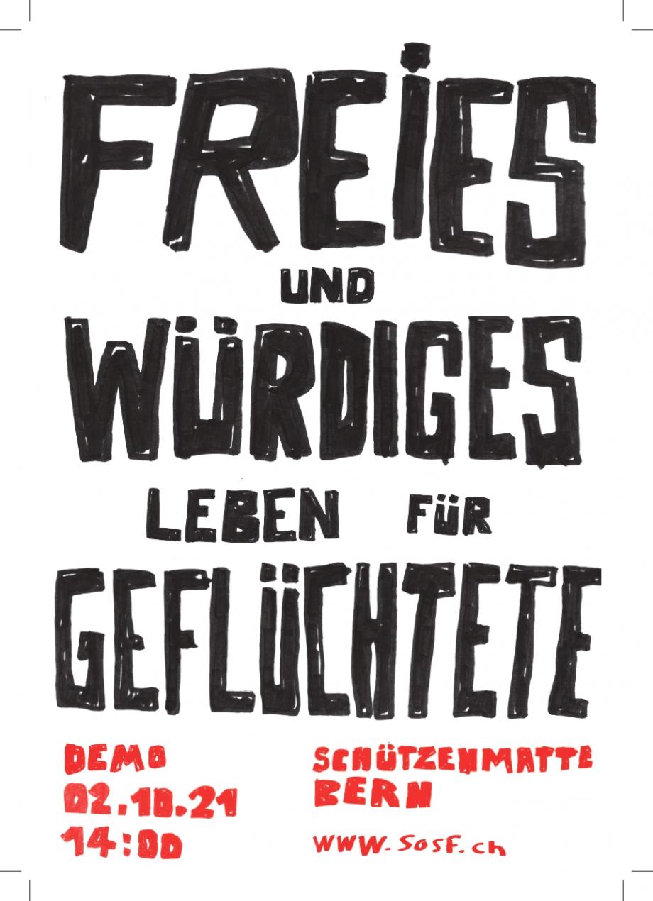 Eylem afişi üzerinde 'Mültecilere özgür ve onurlu yaşam' yazıyor
